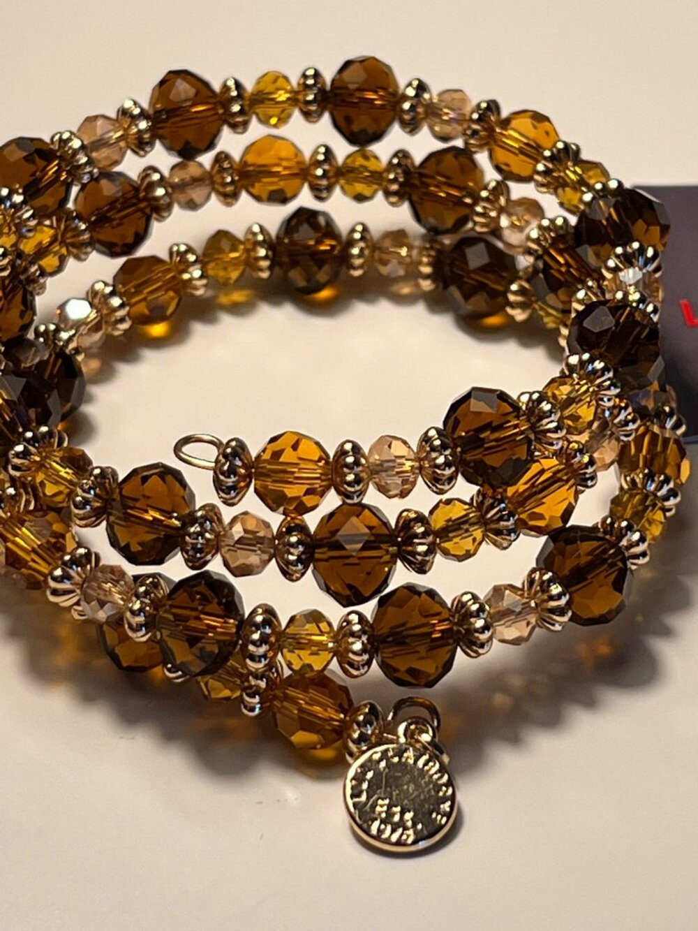 New with tag - Liz Claiborne multi-strand wrap bracelet - amber & brown
